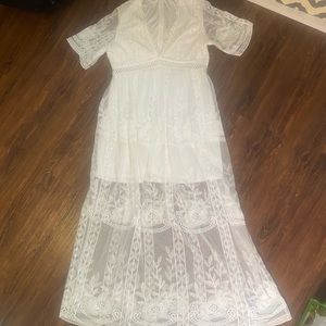 Beautiful white lace dress, perfect for a bride! Great condition, never worn
